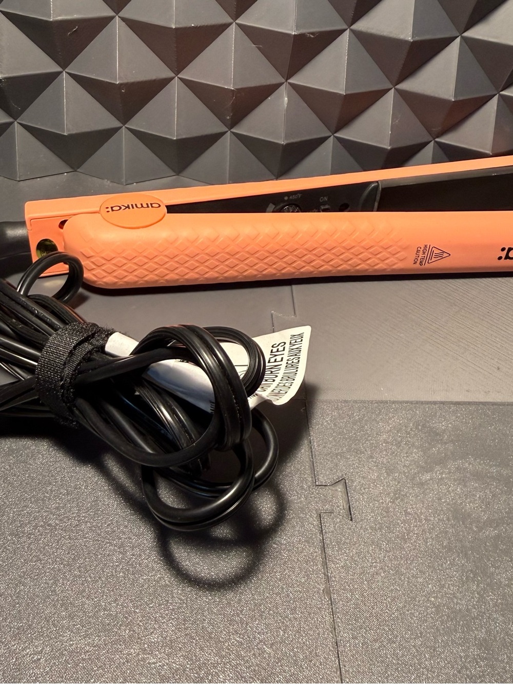 amika Coral-Orange Flat Iron with Black Accent